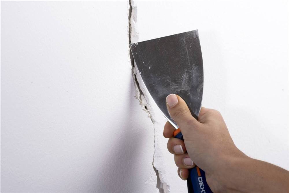 Cómo reparar una pared